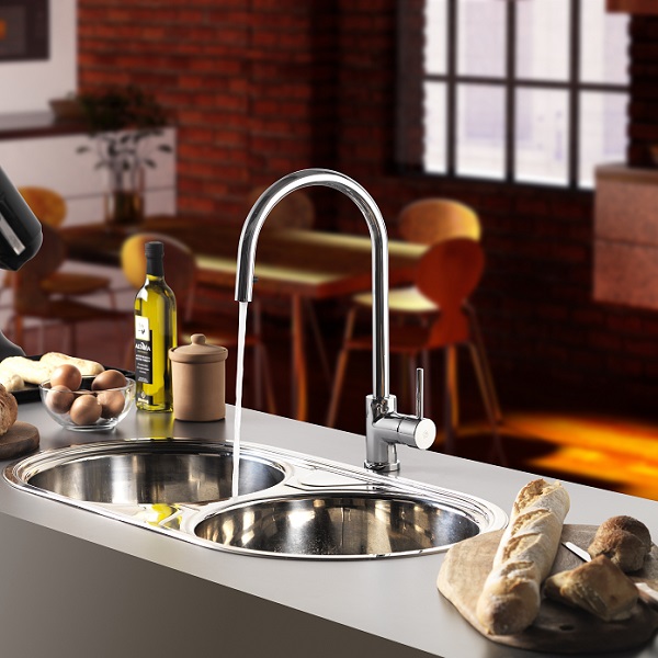 Single handle deck mount kitchen mixer.